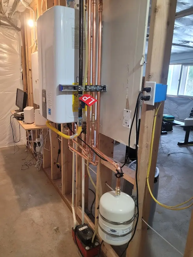 Licensed plumber repairing a kitchen sink in Middletown